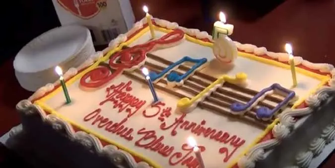 Anniversary cake celebrating 5 years of Overdue Blues Band open mic jams at the Riv