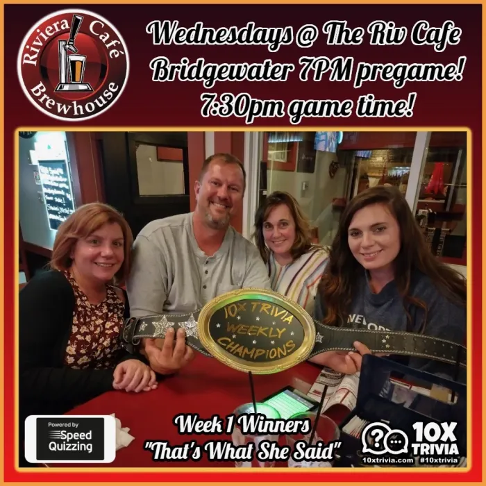 Wednesday trivia week 1 winners with the championship belt